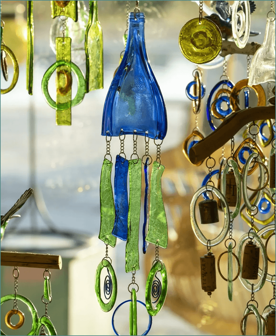 Colorful glass wind chimes with bottle art.